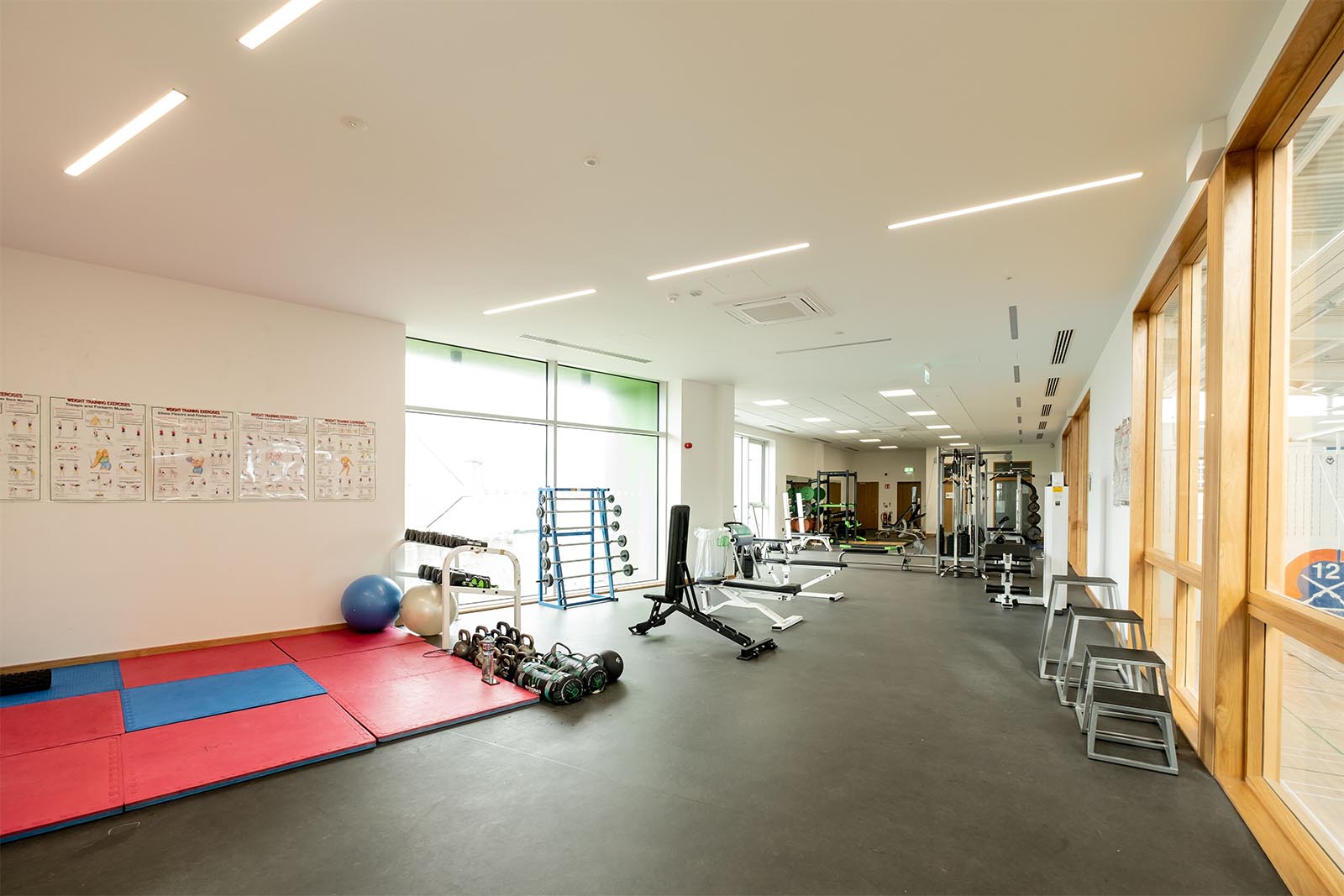 Wide interior view of gym showing equipment