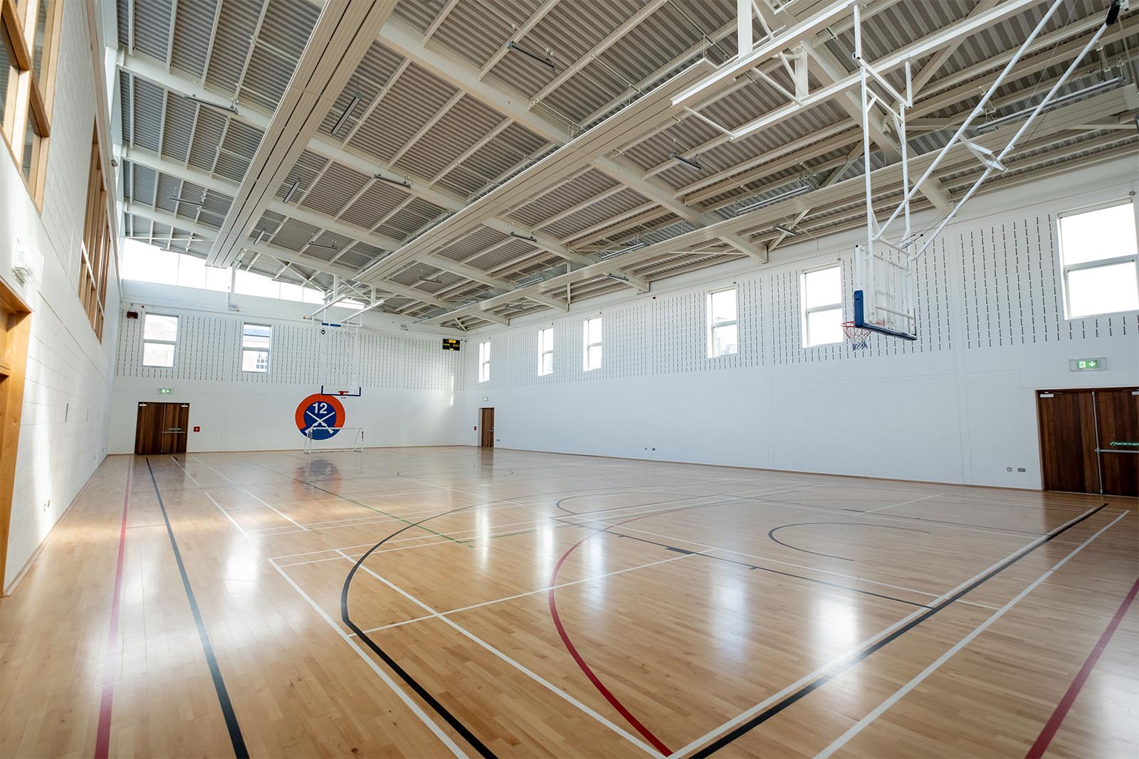 Wide interior view of sports hall